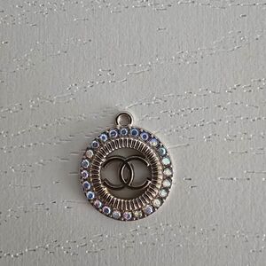CHANEL Silver Pendant with Iridescent Accents
